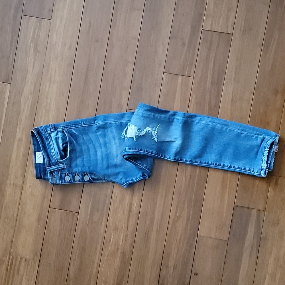 Buckle stretch skinny jeans